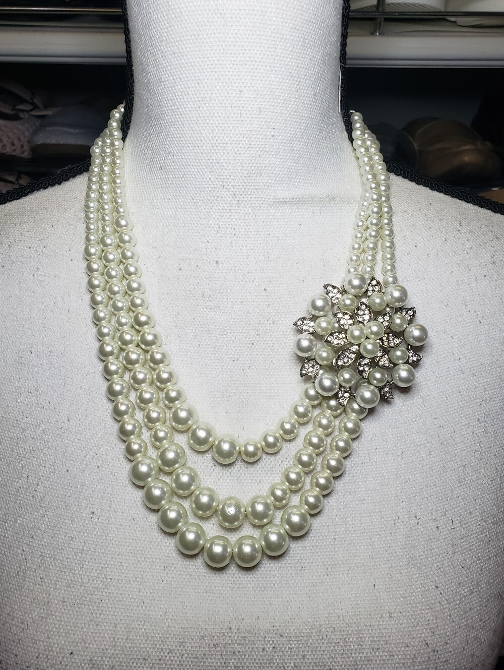 Triple-strand faux pearl necklace